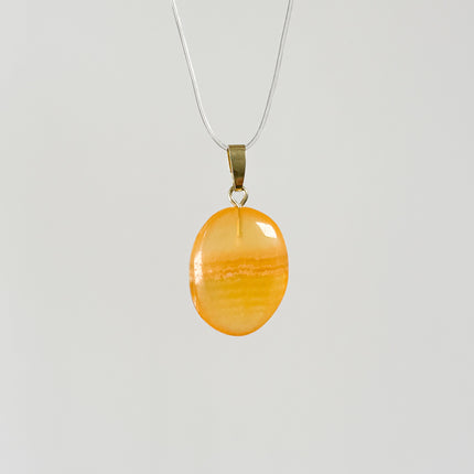 Orangencalcit Anhänger - 925 Silber vergoldet