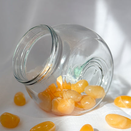 Orangencalcit (Calcit) Trommelstein